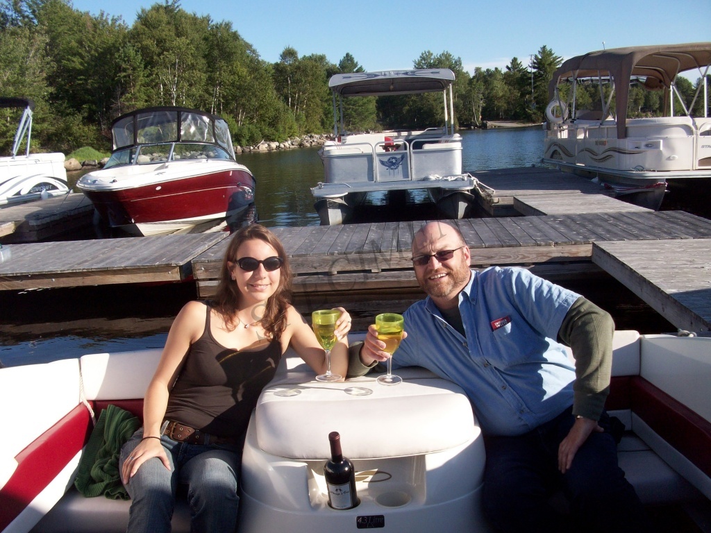 Sarah and I on the boat at 5 Lakes Lodge in Maine.