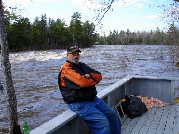 My good friend, Mike Kimball, sitting on the East Branch of the Penobscot. RIP.